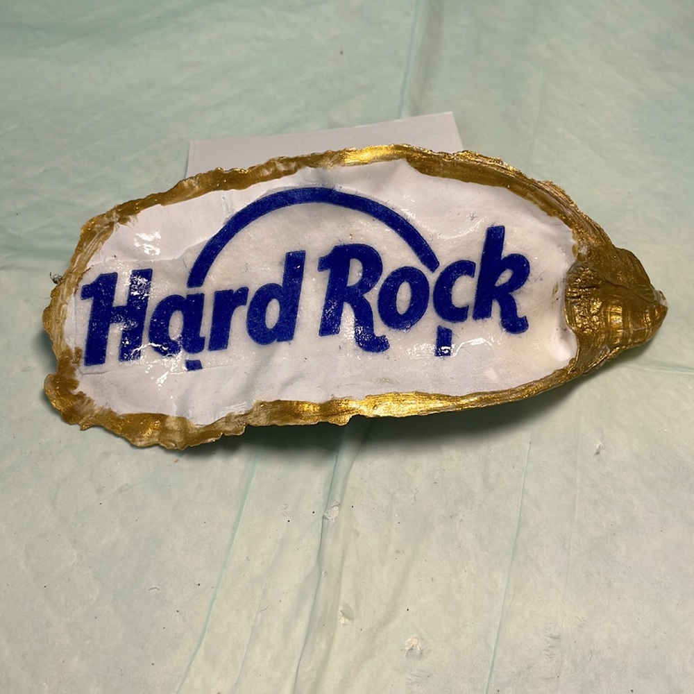 Hard Rock from the Atlantic City Ocean. Hand made. Gold trim, pearl white back